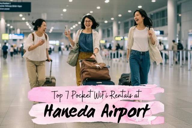 A group of friends laugh and walk with their luggage and phonees through Haneda Airport.