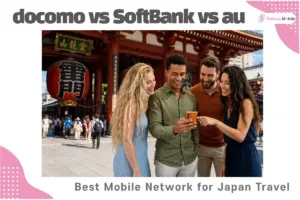 A group of friends smiling in front of a Japanese temple while checking a map to stay connected.