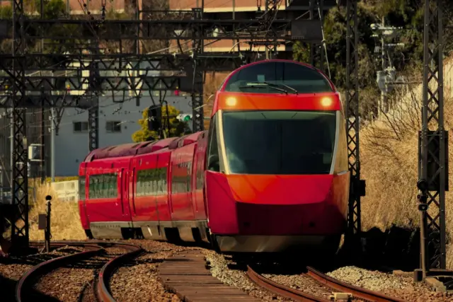 Red train heading to Hakone Onsen