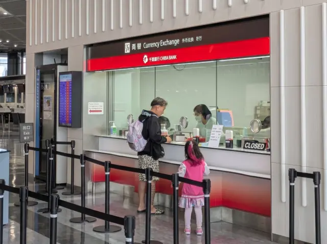 Currency exchange counter at Narita Airport