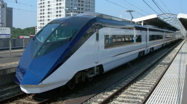Keisei Skyliner train at a station in Japan