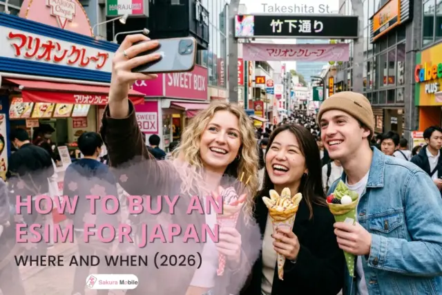 Three friends takin a selfie while eating crepes on Takeshita Street in Harajuku, Tokyo.