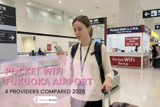 A tourist in Fukuoka Airport looking at her phone with a Pocket WiFi.